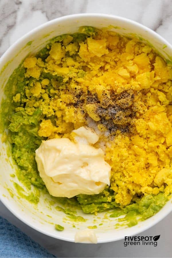 avocado deviled eggs in bowl